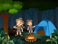 Cartoon of two zookeepers are camping in the forest