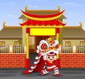 Kid playing chinese dragon dance in front of the temple