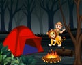 Zookeeper boy and a lion at night campsite Royalty Free Stock Photo
