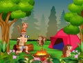 Boy scouts with many animals at the campsite Royalty Free Stock Photo