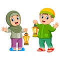 Moslem kids holding lantern Royalty Free Stock Photo