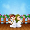 Boy and girl reading book for Islamic Festivals Celebration Royalty Free Stock Photo