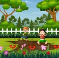 Happy kids playing a mud puddle in the park Royalty Free Stock Photo
