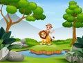 Happy zookeeper boy and lion playing in the nature Royalty Free Stock Photo