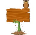 Cartoon zombie hand holding blank sign with owl bird Royalty Free Stock Photo