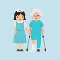 Nurse helping senior patient with a cane.