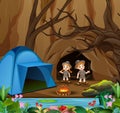 Cartoon kids in explorer outfit camping out near the cave Royalty Free Stock Photo