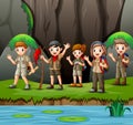 Group of young scout girls and boys in nature
