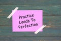 Practice leads to perfection on pink paper Royalty Free Stock Photo