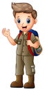 A boy in explorer outfit with backpack