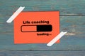 Life coaching loading on paper