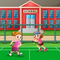 Featuring girls playing tennis at school court Royalty Free Stock Photo