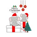 Merry Christmas Greeting Card. Elephants sitting on a gift box. Royalty Free Stock Photo