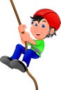 Happy boy climbing rope Royalty Free Stock Photo