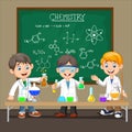 Group of scientist boy doing chemical experiment Royalty Free Stock Photo