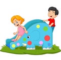 Little kids playing on elephant slide