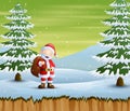 Santa claus walking with bag on snowy road