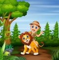 Safari boy with lion walking in the jungle Royalty Free Stock Photo