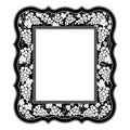 Decorative black and white framework with grapes and leaves.