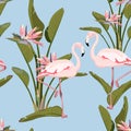 Pink flamingo, strelitzia leaves and flowers plant, vintage blue background. Floral seamless pattern.