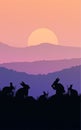 Group of rabbits in the meadow. Natural forest. Wild animals. Mountains horizon hills silhouettes. Sunrise and sunset.