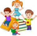 Happy school children with piles of books Royalty Free Stock Photo