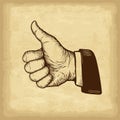 Hand drawn thumb up gesture. Old paper texture background. Engraved style vector illustration. Royalty Free Stock Photo