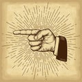 Hand drawn hand gesture. Forefinger on old craft paper texture background. Linear vintage style sun rays. Royalty Free Stock Photo