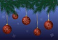 Red hanging balls with decoration of snowflakes and golden tapes on calm purple background. Royalty Free Stock Photo