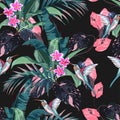 Seamless tropical pattern, vivid tropic foliage, withpink blue palm leaves.