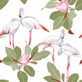 Seamless pattern with white flamingos and pink green magnolia flowers branch with leaves. Simple design for fabric. Royalty Free Stock Photo