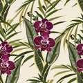 Seamless design pattern arranged with orchids flower, exotic leaves and palms. Beautiful floral print. Vintage colors background. Royalty Free Stock Photo