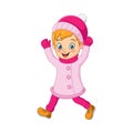 Happy girl in pink winter clothes walking