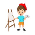 Happy cute little boy artist holding brush and paints Royalty Free Stock Photo