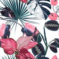 Fashionable seamless tropical pattern with tropical blue pink leaves on a white background. Beautiful exotic plants.