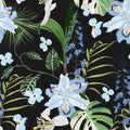 Tropical blue flowers and tropical leaves on black background. Seamless pattern. Jungle foliage illustration.