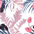 Fashionable seamless tropical pattern with tropical blue pink leaves on a white background. Beautiful exotic plants. Royalty Free Stock Photo