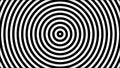 Black and white hypnotic circle pattern