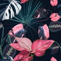 Fashionable seamless tropical pattern with tropical blue pink leaves on a black background.