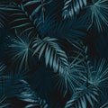 Fashionable seamless tropical pattern with blue tropical palm leaves on a black background.