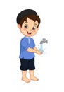 Muslim boy preparing wudhu for prayer Royalty Free Stock Photo