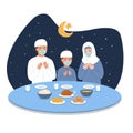 Vector illustration of a Muslim family praying to eat iftar food