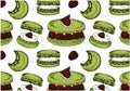 Sketch hand drawn pattern of green matcha tea macarons with raspberry isolated on white background. Royalty Free Stock Photo