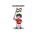 Cute Football Player Holding Hungary Flag. Royalty Free Stock Photo