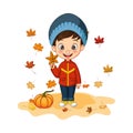 Cartoon little boy in autumn clothes and falling leaves Royalty Free Stock Photo