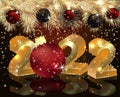 Happy 2022 new year golden card with red xmas ball, Royalty Free Stock Photo