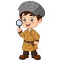 Cute detective boy holding a magnifying glass