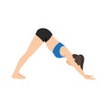 Woman doing Adho mukha svanasana or downward facing dog