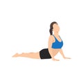 Woman doing Cobra pose or Bhujangasana exercise.