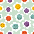 Seamless pattern with funny smiling flowers